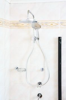 the shower head and handset are connected to the faucet