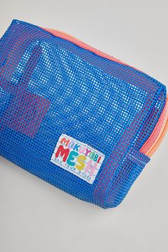 The perfect small case for whatever you need to store- fit your essentials on the go! Use it as a makeup bag, art supply case, a place to store your stamp collection, toiletry bag, travel tech, and more! Content + Care Tear resistant 100% vinyl coated mesh Spot Clean Made in USA Size 5" height x 6" width x 2.5" depth, 3 oz | Mokuyobi Mesh Chubby Zip Pouch in Pacific at Urban Outfitters Zipper Pouch For Travel And Back To School, Playful Zipper Pouch For Travel, Blue Zipper Pouch For Storage, Functional Blue Pouch Cosmetic Bag, Blue Pouch Cosmetic Bag For Organization, Blue Pouch Cosmetic Bag, Blue Rectangular Pouch For Storage, Playful Travel Cosmetic Pouch Bag, Blue Functional Storage Pouch