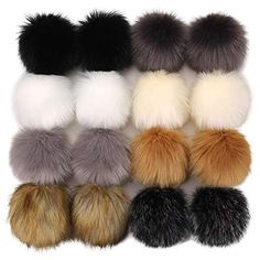 six different colors of fur pom - poms on white and black, one is multi