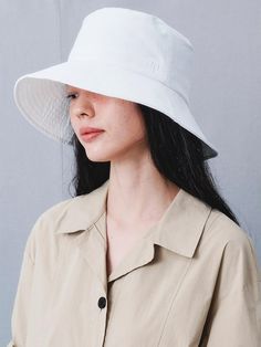 kuho plus adds a captivating European sensibility to contemporary minimalism, proposing new and stylish products. With clean and structured silhouettes, designs that highlight refined uniqueness, and distinguished value delivered through premium materials and high quality. - Elegant cotton twill bucket hat- Wide visor completes natural silhouette- Accented with signature embroidery- Easy to style style with divers outfit  <form class=stretch mx-2 flex flex-row gap-3 last:mb-2 md:mx-4 md:last:mb-6 lg:mx-auto lg:max-w-2xl xl:max-w-3xl>  </form> Modern Everyday Hats For Spring, Modern Everyday Spring Hats, Modern Everyday Hats, Brimmed White Bucket Hat, Modern Adjustable Hats, Modern White Hat With Curved Brim, White Wide Brim Bucket Hat For Everyday, Spring White Bucket Hat, Elegant White Bucket Hat