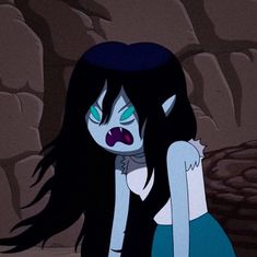 a cartoon character with long black hair and green eyes sitting on the ground in front of a stone wall