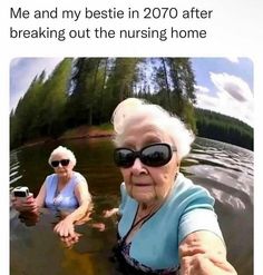 an older woman is taking a selfie with her friend in the water while they are swimming