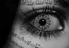 a woman's eye with musical notes in the background