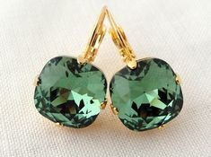 "Green European crystal drop earrings, Royal green, kelly green, drop earrings, Bridesmaids gift, Bridal earrings,Dangle earrings, Gold plate Lovely and chic. These earrings are so sweet and romantic. They would be great for bridal wedding or for any available other day. Perfect gift for bridesmaids or any available other occasion. They are made of 14k gold plated posts and Swarovski crystals, all set in prong setting. Made with CRYSTALLIZED™ - High quality genuine Europen (Austrian) Elements Th Green Drop Earrings For Bridesmaid Gift, Emerald Bridesmaids, Emerald Drop Earrings, Swarovski Crystal Drop Earrings, Bijoux Art Nouveau, Emerald Earrings Drop, Bridal Earring, Earrings Emerald, Crystal Bridal Earrings