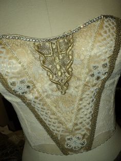 Antique Bridal Bustier Wedding Corset Cream Embellished with Metallic Applique and Rhinestone Trim S Glamorous Wedding Corset With Fitted Bodice, Elegant Lace Wedding Bodice, Glamorous Fitted Bodice For Wedding, Glamorous Embellished Wedding Corset, Elegant Gold Wedding Corset, White Victorian Wedding Corset, Glamorous Wedding Corset, Lace Boned Bodice For Wedding, Elegant Cream Bodice For Wedding