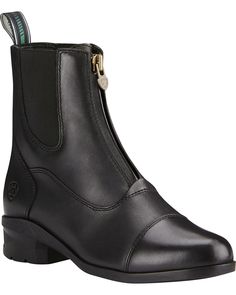 a pair of black leather boots with zippers