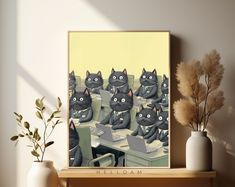 a group of black cats sitting on top of a desk