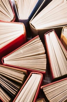 a pile of books sitting next to each other