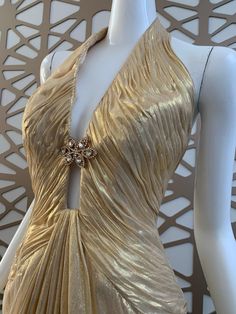 Gold Luxury Gown With Fitted Bodice, Luxury Gold Evening Dress With Fitted Bodice, Fitted Luxury Gold Gown, Luxury Fitted Gold Gown, Gold Fitted Luxury Gown, Luxury Gold Evening Dress, Luxury Gold Evening Dress For Prom, Luxury Halter Neck Evening Dress For Wedding, Gold Backless Evening Dress For Wedding