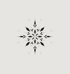 a black and white snowflake on a gray background