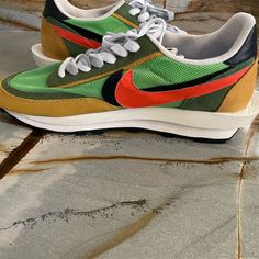 Nike Mens Ld Waffle/Sacai Green Gusto/Safety Orange Brand New No Box Nike Custom Green Sneakers With Rubber Waffle Outsoles, Nike Green Retro Sneakers, Retro Green Nike Sneakers, Nike Orange Sneakers With Vibram Sole, Orange Custom Lace-up Sneakers With Rubber Waffle Outsoles, Waffle Sacai, Nike Mens, Shoes Nike, Green Orange