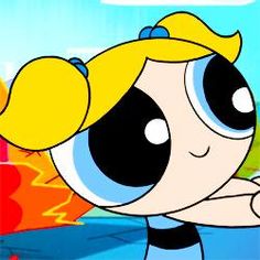 the powerpuff character is pointing at something in front of her face and she has yellow hair