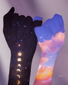 an image of a hand with the moon and phases on it in front of a sky background