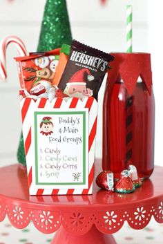 a candy jar and some candy on a table