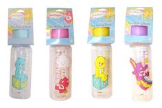 three different types of baby bottles in the same package, one with a bear on it