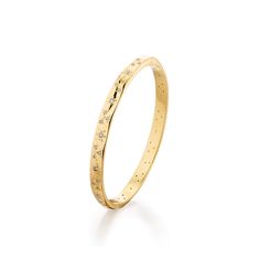 Something new and full of magic introducing our Fair Dust oval bangle made of 18K recycled gold with 46 diamonds and our signature star points and 5 prong point. Fits the average size wrist. Diamonds: .83 tcw Recycled 18K Yellow Gold Hinge Box Clasp Size: 6.5" Handcrafted in NYC Gold Bangle With Rose Cut Diamonds, Yellow Gold Bangle With Rose Cut Diamonds, Oval Bangle, Bangles Making, Box Clasp, Fairy Dust, Recycled Gold, Something New, Recycling