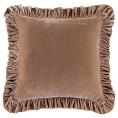 a brown pillow with ruffled edges