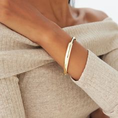 Enhance your wrist's elegance with our 14K Gold Dome Bangle, a classic and timeless gold bracelet bangle perfect for stacking. This plain gold-hinged bracelet exudes sophistication, making it a thoughtful gift for her and a versatile addition to your jewelry collection. Elevate your style with this chunky and elegant gold stacking bracelet that captures the essence of timeless beauty. ▶Item Details * Made to Order * Gold KT: 14K Solid Gold (also available in 18K  upon request) * Custom Gold Color: Rose Gold, Yellow Gold, White Gold * Width: 7.5MM * Height: 2.7MM * Ready to Ship in 3-10 Business Days ▶ See more of our Gold Bangle - http://etsy.me/2l9VKBr ▶ See our storefront here - http://etsy.me/2lUcVnH  ▶ All store sections here * Diamond Rings - http://etsy.me/2lwKUl8 * Diamond Earrings Elegant Everyday Gold Bangle Bracelet, Adjustable Classic Gold Oyster Bracelet, Classic Adjustable Gold Oyster Bracelet, Elegant Everyday Bangle With Bracelet Strap, Classic Jubilee Cuff Bangle Bracelet, Classic Bangle Bracelets, Classic Bangle With Jubilee Bracelet, Elegant Adjustable Name Bangle Bracelet, Elegant Adjustable Name Bangle