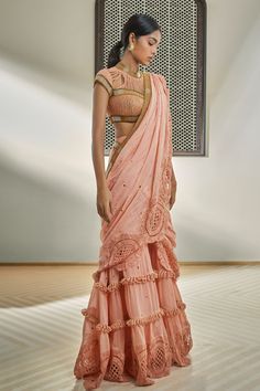 Pink pre-draped saree with floral crochet lace, loop rope detailing and badla embroidery.
Components: 1
Pattern: Hand Embroidery, Crochet
Type Of Work: Floral, Badla, Rope
Fabric: Chanderi
Color: Pink
Other Details: 
Golden pipe embellished pallu border
Hand embroidered loop rope detailing
Note: Blouse worn by the model is not for sale
Occasion: Sangeet,Reception - Aza Fashions Festive Pre-draped Saree With Lace Work For Designer Wear, Festive Pre-draped Saree With Lace Work, Traditional Designer Pre-draped Saree With Lace Work, Festive Pre-draped Georgette Saree With Lace Work, Bollywood Style Georgette Pre-draped Saree With Lace Work, Georgette Pre-draped Saree With Lace Work, Festive Pre-draped Saree In Georgette With Lace Work, Traditional Pre-draped Saree With Lace Work, Festive Designer Pre-draped Saree With Lace Work