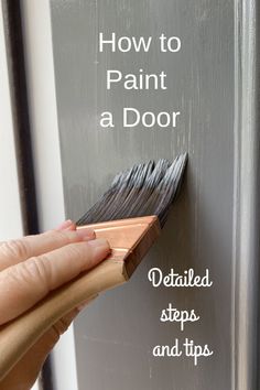 a hand holding a brush to paint a door with the words how to paint a door written on it