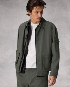 The Cade. Outfitted with utilitarian flap pockets, our jacket is perfectly oversized and crafted in a Japanese tropical wool. Featuring adjustable details for a personalized fit. Dusty Green XXL Khaki Cargo Style Outerwear For Work, Khaki Unstructured Utility Jacket With Patch Pockets, Unstructured Khaki Utility Jacket With Patch Pockets, Khaki Relaxed Fit Utility Shacket, Relaxed Fit Cargo Style Utility Outerwear, Urban Cargo Outerwear For Work, Unstructured Outerwear With Patch Pockets For Streetwear, Urban Cargo Style Outerwear For Workwear, Khaki Shacket With Flap Pockets And Relaxed Fit