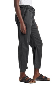 A rope drawstring gathers the waist of these kicky cropped pants made from a stretch-kissed twill for all-day comfort. 24 1/2" inseam; 18" leg opening; 12" front rise; 15 1/2" back rise Elastic/drawstring waist Front and back patch pockets 62% lyocell, 36% cotton, 2% spandex Machine wash, line dry Imported Mid-rise Relaxed Fit Pants With Drawstring, Relaxed Fit Mid-rise Pants With Drawstring, Relaxed Fit Mid-rise Drawstring Pants, Drawstring Tapered Leg Workwear Bottoms, Fabric Gift Bags, Nordstrom Store, Free Fabric, Back Patch, Drawstring Pants