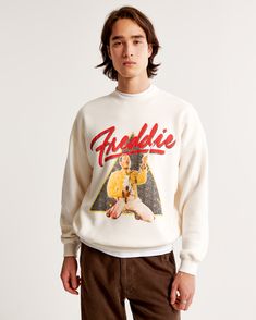 Celebrate an icon with the Men's Pride Freddie Mercury Graphic Crew Sweatshirt from Abercrombie & Fitch. This off-white sweatshirt is a tribute to legendary style and bold expression.

- Size: XXS
- Color: Off White
- Material: Cotton, Polyester
- Gender: Male
- Age Group: Adult
- Features: Crew neckline, banded hem and cuffs, Freddie Mercury-inspired graphic on chest

Crafted in our ultra-softAF fleece fabric, this oversized-fit silhouette ensures comfort and a relaxed look. Whether you're loun Off White Sweatshirt, Legendary Singers, Classic Sweatshirt, American Clothing, Iconic Style, Freddie Mercury, Crew Sweatshirts, White Sweatshirt, White Material