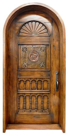 an old wooden door with carvings on it