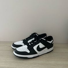 These Are The Nike Panda Dunks, Black And White. They Are A Size 9.5 In Women’s And 8 In Men’s. They Run A Little Big No More Than Half A Size Bigger. They Have A Nike Imprint On The Back. Shoelaces Can Be Adjusted. Like New. Kept In Nice Condition. Message Me If Interested!! Dunks Black, Nike Panda Dunks, Nike Panda, Panda Dunks, Black Nikes, Womens Shoes Sneakers, No More, Shoe Laces, Nike Women