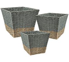 three gray and brown baskets sitting next to each other