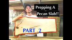 a man holding a piece of wood with the words prepping a pecan slab part 2