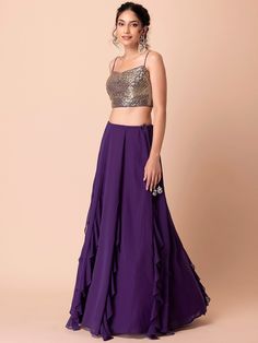 Introducing our charming purple georgette party wear lehenga with sequins choli, a stunning ensemble perfect for weddings, receptions, and parties. Crafted from high-quality georgette material, this lehenga features a beautiful purple color that exudes elegance and style.
The accompanying choli is adorned with sequin and embroidered detailing in a similar purple shade, adding a touch of glamour to the overall look. Made from georgette material as well, it ensures comfort and a flawless fit. To c Types Of Lehenga, Partywear Lehenga, Purple Lehenga, Georgette Material, Lehenga Dress, Lehenga Choli Designs, Indian Lehenga Choli, Dress Saree, Global Dress