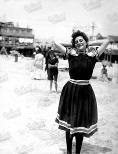 "WOMAN in VINTAGE SWIMWEAR 1900s Vintage Printable, Summer Holiday, Swimsuit Fashion Ephemera, Antique Photograph Digital Download 300dpi Jpg This is a genuine antique photograph dating from the 1900s, which measures 3.5\" x 4.5\". The picture features a lovely young woman, posing happily on a beach in her stylish and perfectly period 1900s swimwear.  This vintage photo is a fantastic piece of social history ephemera, making it perfect for including with other items in summer vacation, seaside or even vintage fashion themed junk journal tuck spots and pockets. It could also be used in collage, card making, mixed media projects, scrapbooking and more.  ▶ ITEM DETAILS:  -The file is a high quality 300dpi image in JPG format. It measures 3.5\" x 4.5\" or 1050 x 1376 pixels.  The file you will Vintage French Swimwear, Vintage Swimwear Beach, Framed Vintage Swimwear, Summer Swimwear Vintage, Vintage Swimwear Goth, Female Swimmers, Bathing Costumes, Vintage Swimwear, Photo Vintage