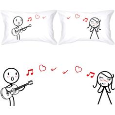 two pillows with stick figures playing music on them