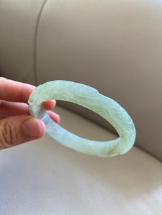 "🌈 Jade Bangle 58.6mm (2.31\"), Round Shape, Light Green 🌷 Untreated Natural Jadeite/ Grade A Jade 🌷 Certified : Yes 🌷 Jade from Myanmar/ Burma 🌷 Shape : Round 🌷 Inner diameter : 58.6mm / 2.31\" 🌷 Width & Thickness : 11.3 x 7.6mm 🌷 Color : Light Green 🌷 Free standard shipping from Hong Kong with tracking included 🌷 Take approximately 7-21 days to arrive worldwide ❤️ In Chinese Culture: Young people wear jade pendant will have a prosperous life, attracts good luck and friendship Old Carved Jade Round Bracelets, Carved Jade Bangle Bracelet, Carved Jade Bracelets, Carved Round Bracelets For Wedding, Carved Round Wedding Bracelets, Wedding Carved Round Bracelets, Carved Jade Bracelet, Lavender Green, Jade Bangle