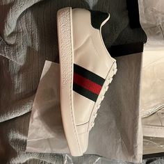 Brand New Gucci Ace Leather Sneaker With Green And Red Stripes. Never Worn Or Taken Out Of Box Until Now. Authentic. Size 36/6 White Gucci Sneakers In Calf Leather, Gucci White Calf Leather Sneakers, White Gucci Calf Leather Sneakers, Shoes Gucci, Green And Red, Gucci Shoes, Leather Sneakers, Womens Shoes Sneakers, Leather Women