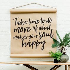 a sign that says, take time to do more of what makes your soul happy