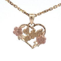 "14k Yellow Gold #1 Mother Heart Pendant /Charm with Rose Gold Flowers - Vintage ~  ET1540 Metal Content: Solid 14K Gold Chain is NOT included Pendant Measurements Length including bail:  3/4\" (19mm) Width:  11/16\" (17mm) Bail opening: 4mm x 3mm Weight: 1.0 Grams Stamps: ZED 14k Condition:  New  Each piece is thoroughly examined and refinished as needed by our professional jewelers, tested to guarantee metal content,  graded by our in-house GIA (Gemological Institute of America) Graduate Gemologist, and inspected for quality before being carefully packaged and promptly shipped. Thank you for taking the time to shop with us! We have hundreds of more listings, with more being added every week! From necklaces to bracelets, the classics and trendy.  We are likely to have something you and yo 14k Stamped Rose Gold Jewelry For Valentine's Day, Rose Gold 14k Stamped Jewelry For Valentine's Day, 14k Rose Gold Jewelry For Valentine's Day, Heart-shaped Jewelry For Mother's Day, Mother's Day Heart Pendant Jewelry With Rose Design, Mother's Day Heart Pendant With Rose Design, Mother's Day Rose Design Jewelry For Anniversary, Stamped 14k Rose Gold Necklace For Mother's Day, Hallmarked Rose Gold Jewelry For Mother's Day