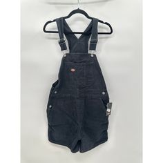 Preloved In Great Utility Shortalls With Pockets, Fitted Shortalls With Pockets For Workwear, Black Cotton Jumpsuits And Rompers With Pockets, Black Bib Front Utility Overalls, Black Utility Overalls With Bib Front, Black Utility Overalls With Side Pockets, Casual Fitted Shortalls For Workwear, Black Overall Jumpsuits And Rompers With Pockets, Fitted Casual Shortalls For Work