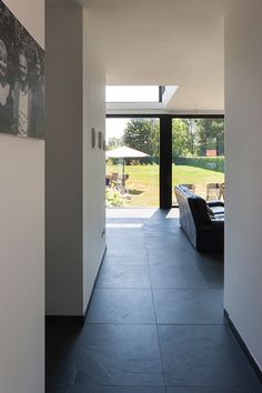 an open hallway leading to the living room