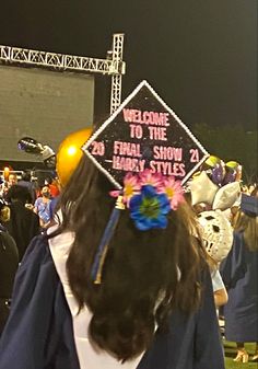 a group of people in graduation caps and gowns