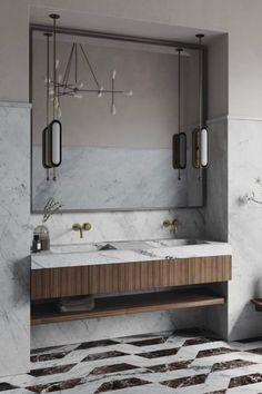 a bathroom with marble and wood accents