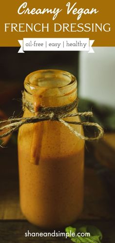 a mason jar filled with creamy vegan french dressing