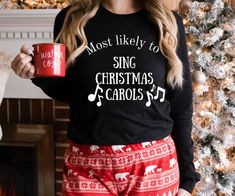 Do you know someone who loves Christmas music? This matching family tee is perfect for any Christmas music lover or musician! This Bella Canvas 3501 long sleeve makes a great gift idea or Christmas party t shirt. * 100% combed and ring-spun cotton * Heather colors are 52% combed and ring-spun cotton, 48% polyester * Athletic Heather is 90% combed and ring-spun cotton, 10% polyester * Fabric weight: 4.2 oz/yd² (142.4 g/m²) * 32 singles * Regular fit * Side-seamed construction * Crew neck * Cover-stitched collar * 2″ (5 cm) ribbed cuffs * Blank product sourced from Nicaragua, Honduras, or the US This product is made especially for you as soon as you place an order, which is why it takes us a bit longer to deliver it to you. Making products on demand instead of in bulk helps reduce overproduc Christmas Party Tops, Funny Christmas Tshirts, Formal Trousers, Family Tees, Festival Shirts, Dental Hygienist, Drinking Shirts, Funny Christmas Shirts, Business Outfit