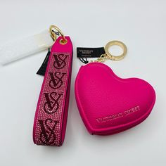 Brand New With Tags Victoria's Secret Sparkle Pink Rhinestones Wristlet Strap & Heart Pouch Keychain In Hot Pink Set. The Ultimate Hands-Free Accessory. Add This Wristlet Strap To Pouches Or Keys To Keep Essentials Close. 3" L 6 3/4" H Attaches To Totes, Backpacks, Or Can Be Used Separately As Keychain Add A Little Romance To Your Everyday Style With This Heart-Shaped Accessory. 3.9"L 0.94"W 3.4"H Top Zip Attaches To Totes, Backpacks, Or Can Be Used Separately As Keychain Hot Pink Set, Car Keychain Ideas, Hot Pink Cars, Pouch Keychain, Keychain Charms, Pink Keychain, Car Key Holder, Girly Car, Handbag Essentials