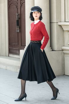 About this item: This black circle skirt has an embroidered design on the waist. The exquisite midi black wool skirt is tailored to perfection, ensuring a snug yet elegant fit that exudes sophistication and style.  With its timeless silhouette and luxurious feel,  this bespoke womens pleated wool skirt is a true investment piece that will elevate any outfit to new levels of refinement and class. DETAIL * 30% wool, 30% fiber, 40% polyester * Fully satiny lining, more nice to the touch body * Two Winter Evening Knee-length Skirt, Knee-length Evening Skirt For Winter, Elegant Black A-line Pleated Skirt, Elegant Winter Pleated Midi Skirt, Elegant Winter Midi Pleated Skirt, Elegant Winter Pleated Flared Skirt, Formal Flared Pleated Skirt For Winter, Black Pleated Full Skirt For Winter, Elegant Black Winter Skirt