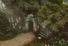 a bench sitting in the middle of a lush green forest next to a stone walkway