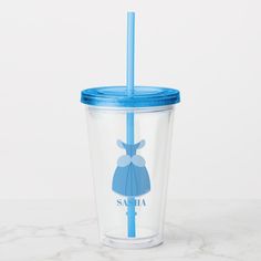 a plastic cup with a blue straw in it