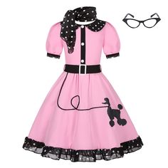 a pink dress with black and white poodles on the collar, neckline, and sleeves