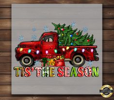 red truck with christmas tree and lights on it's back saying tis the season